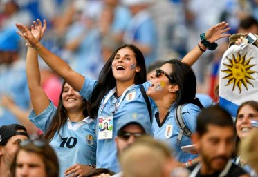 - Uruguay fans add more heat. (AP Photo/Martin Meissner)